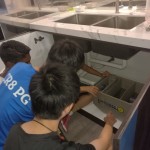 Field trip for students to study kitchen’s grease trap process