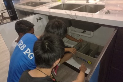 Field trip for students to study kitchen’s grease trap process